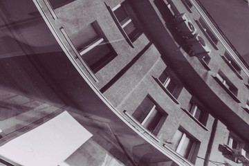 Street photography - reflection in the pool after rain.