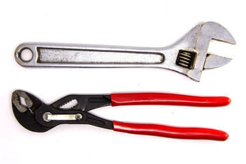 Adjustable pliers and Wrench isolated on a white background. Studio shot