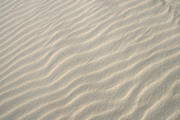 Close up of sand on a beach.