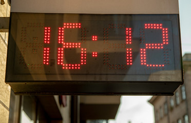 Digital clock. Glowing numbers