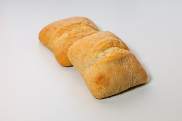 Fresh gluten free grain bread with seeds isolated on white background.