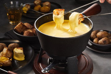 Delicious melted cheese fondue with dipping forks
