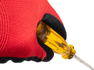 A yellow screwdriver in hand