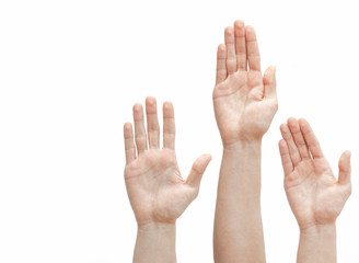 Raised up hands, palms, fingers on white background