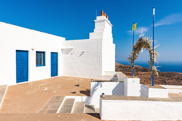 The chapel of Agios Symeon built in 1667 at the top of the mountain. Sifnos island, Cyclades, Greece - obrazy, fototapety, plakaty
