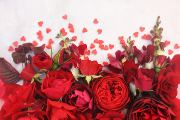 Red festive rose and flowers background, love card, selective focus, toned image	
