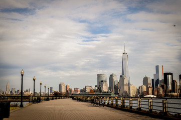 New York City, Manhattan Midtown skyline and Jersey City skyline with  skyscrapers from the Liberty...