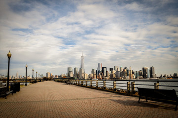 New York City, Manhattan Midtown skyline and Jersey City skyline with  skyscrapers from the Liberty...