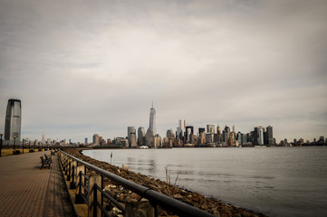 New York City, Manhattan Midtown skyline and Jersey City skyline with  skyscrapers from the Liberty...