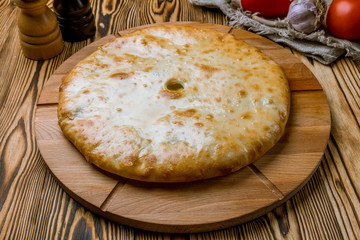 Ossetian pie with meat and mushrooms