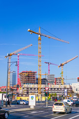 Fototapeta na wymiar cranes on construction site in Berlin