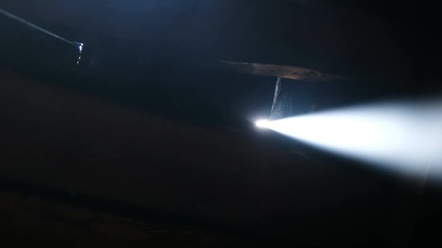 Supernatural phenomenon - the bright sun rays of the sun shine through the gaps, camera movement