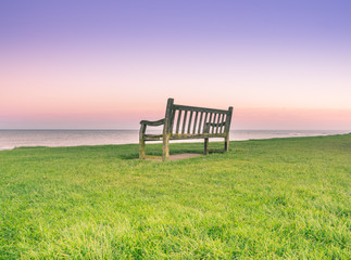 Vintage bench overlooking the ocean