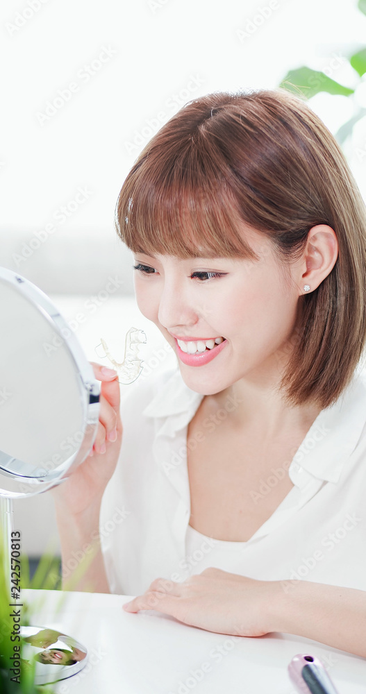 Sticker woman with retainer for teeth