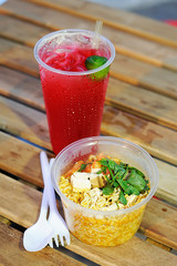 Mee Curry in cup and cold lemon syrup