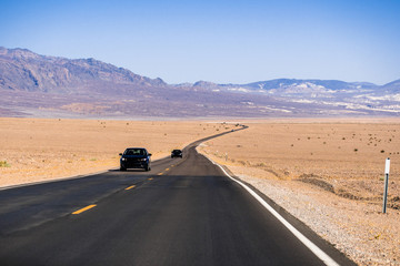 Driving through Death Valley National Park on a hot day, California