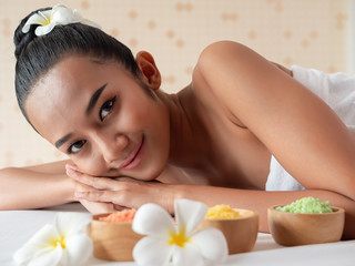 Close-up of Asian girls relaxing on bed mattresses In the Spa