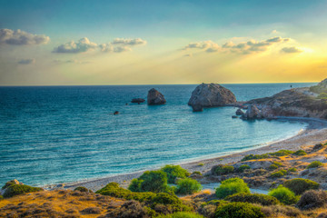 Sunset view over Petra tou Romiou alas Aphordite's rock on Cyprus