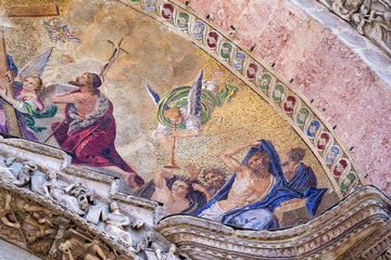 Detail of the Last Judgement mosaic on the exterior of St. Mark's Basilica in Venice, Italy