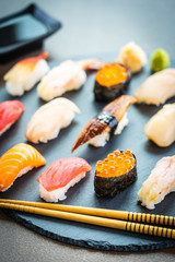 Nigiri sushi set with salmon tuna shrimp prawn eel shell and other sashimi