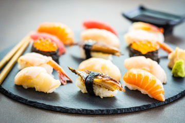 Nigiri sushi set with salmon tuna shrimp prawn eel shell and other sashimi