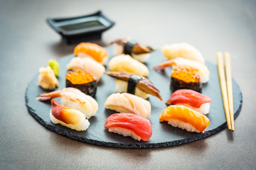 Nigiri sushi set with salmon tuna shrimp prawn eel shell and other sashimi