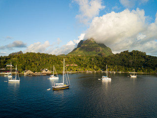 Aerial image from a drone of blue lagoon and Otemanu mountain at Bora Bora island, Tahiti, French Polynesia, South Pacific Ocean (Bora Bora Aerial).