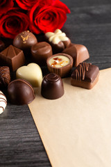 Blank Page for a Love Letter with Chocolates and Roses