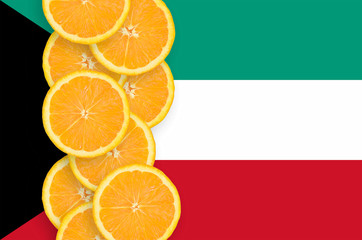 Kuwait flag and citrus fruit slices vertical row