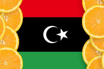 Libya flag  in citrus fruit slices vertical frame