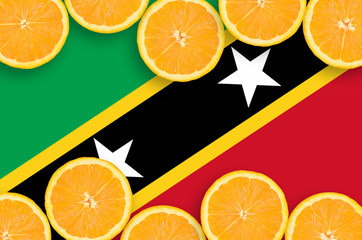 Saint Kitts and Nevis flag  in citrus fruit slices horizontal frame