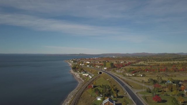 Aerial view of the Atlantic Ocean Coast during a sunny morning. Taken near Carleton, Quebec, Canada.