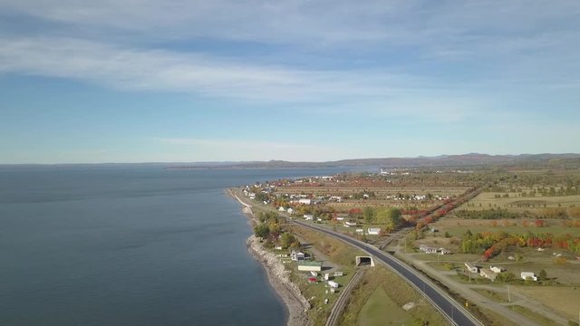 Aerial view of the Atlantic Ocean Coast during a sunny morning. Taken near Carleton, Quebec, Canada.