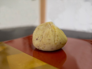 a kind of Japanese sweets. It is sweet chestnuts bun.