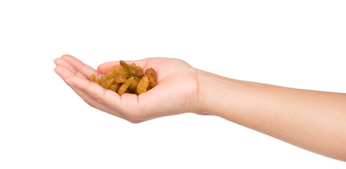 hand holding Raisins isolated on white background