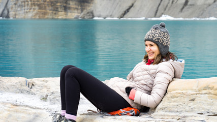 Hiker enjoying glacier lake in Glacier National Park