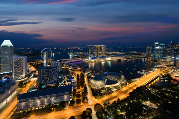 Fototapeta na wymiar Aerial view of Singapore business district and city at night in Singapore, Asia.