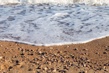 The wave fights about the coast. A surf on the Mediterranean Sea. A beautiful sea landscape on the coast of Turkey