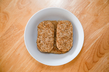 Rectangular wheat biscuits in a bowl