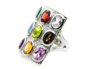 Ring with differet color gemstone on whit background