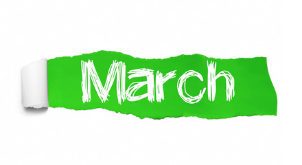 The word March appearing behind green torn paper