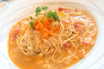  Spaghetti with crab and shrimp sauce. seafood spaghetti in white plate