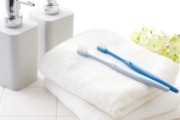 Obraz na płótnie Canvas 歯ブラシ　バスルームイメージ　Toothbrush and bathroom tile
