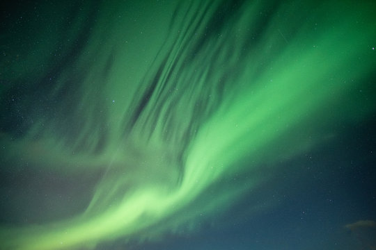 Beautiful Northern lights, Aurora borealis dancing on night sky