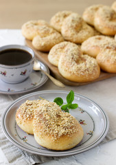 Traditional Romanian and Moldavian sweet buns in the form of eight with honey glaze and nut crumbs.