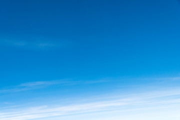 Obraz premium Blue sky on a sunshine day with white sea of clouds at the bottom. It is like heaven going along the aviation trip in the cold season in asia.