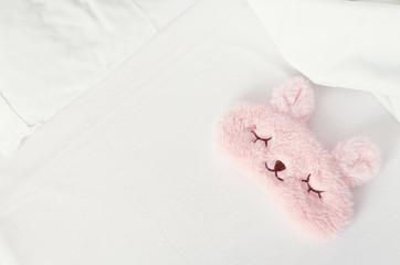 White bedding sheets and pillows