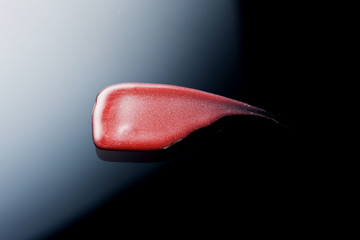 Lipgloss texture with black background