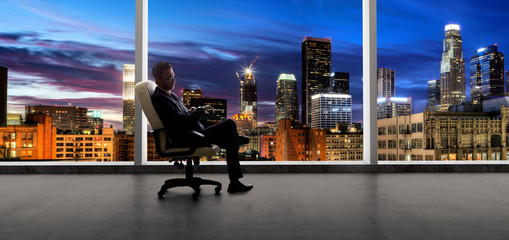 Businessman in an empty office for a startup or failure and bankruptcy in city of LA