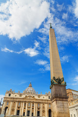 Fototapeta na wymiar Obelisk and Basilica di San Pietro on Saint Peter's square. Vatican